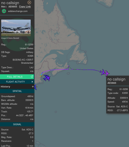 Two Stratotanker tanker airplanes heading across the ocean towards europe