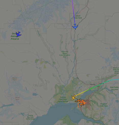 adsb exchange screenshot showing the two planes with some extra military planes visible
