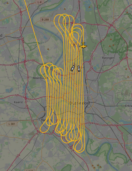 asdb tracker screenshot der ein flugzeug mit einer zigzag router über der stadt zeigt
